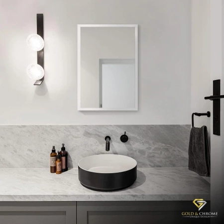 Rectangular mirror in a black frame 65x45cm