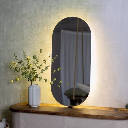 Illuminated oval LED mirror 65x45cm, three colors with a motion sensor